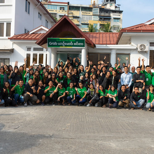 a group of people posing for a photo