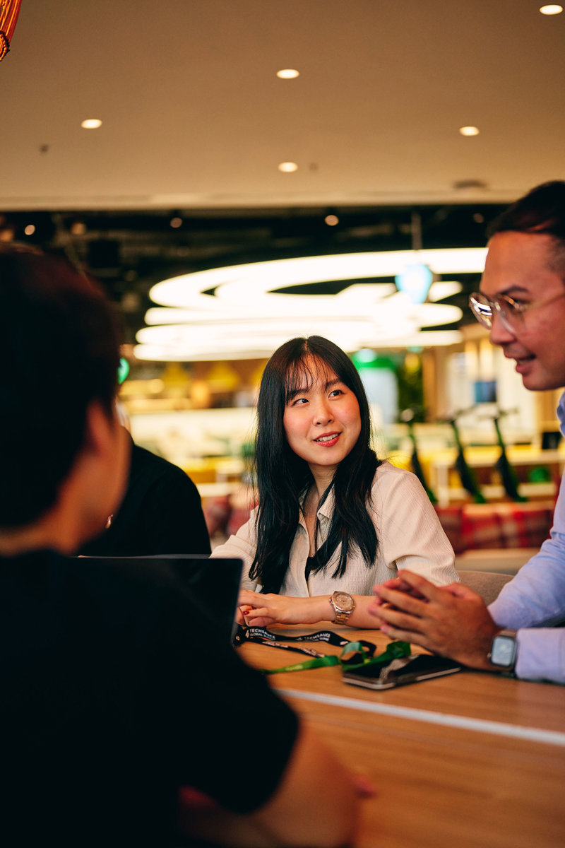 a group of people sitting at a table