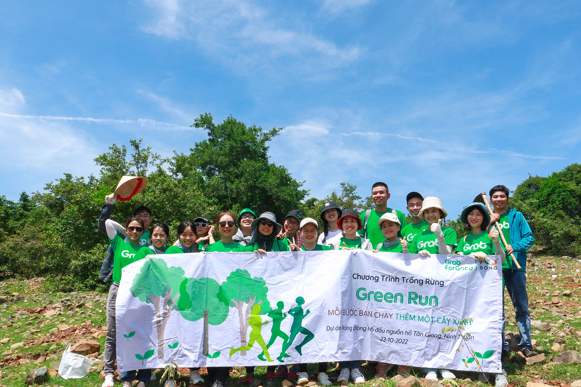 a group of people holding a banner