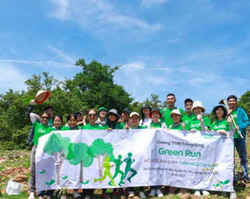 a group of people holding a banner