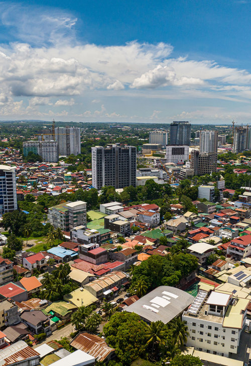 a city with many buildings and trees