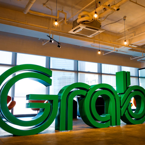 a large green sign in a room