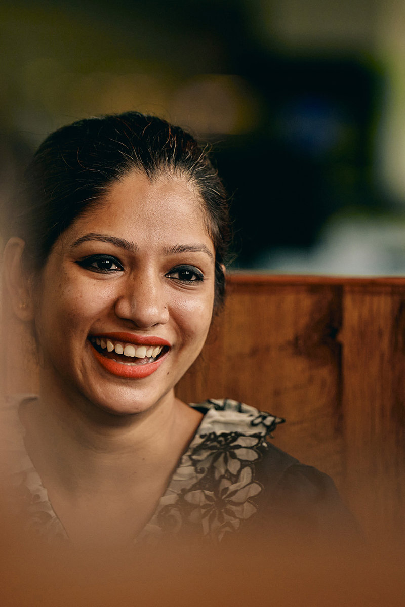 a woman smiling at someone
