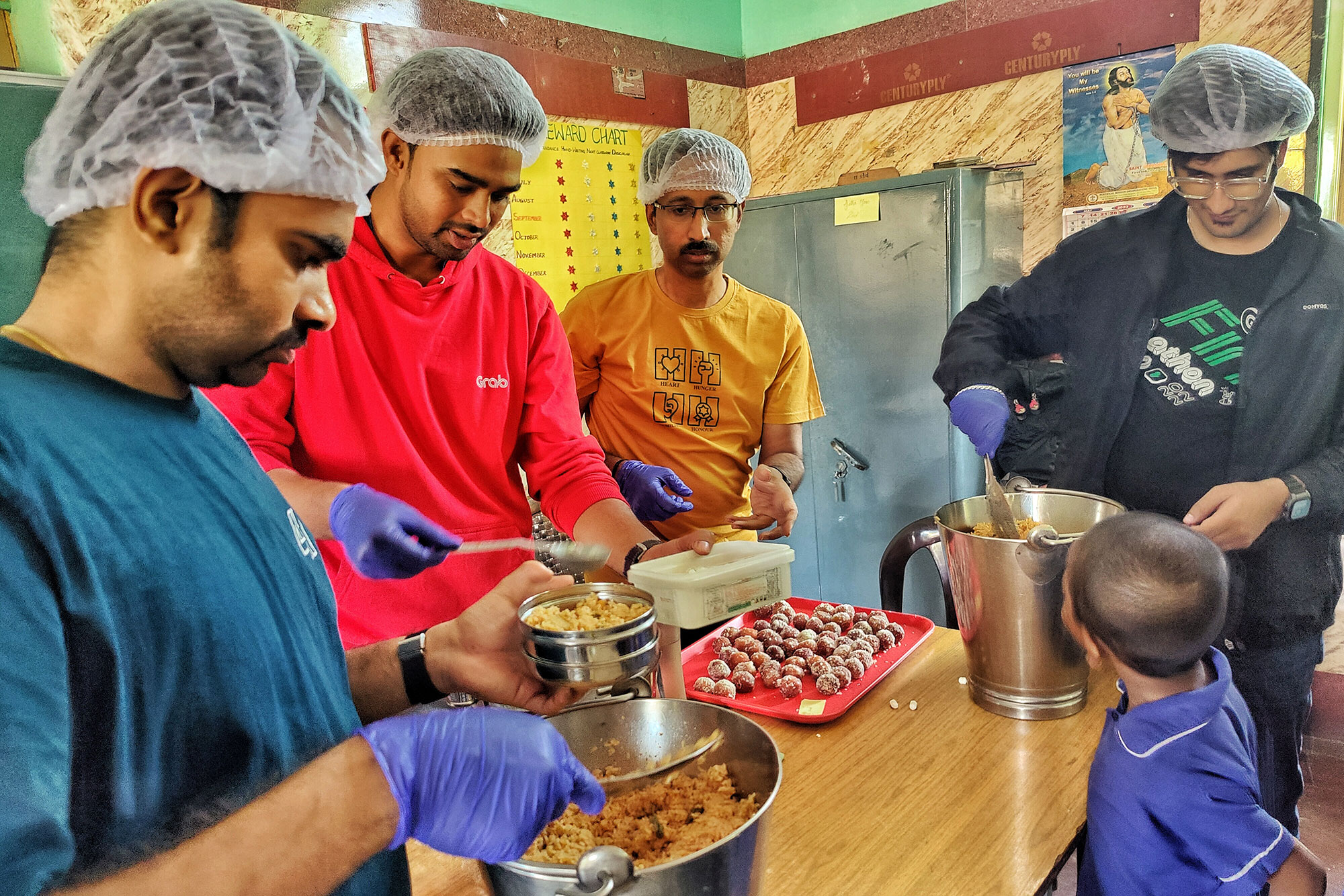 a group of men in a kitchen