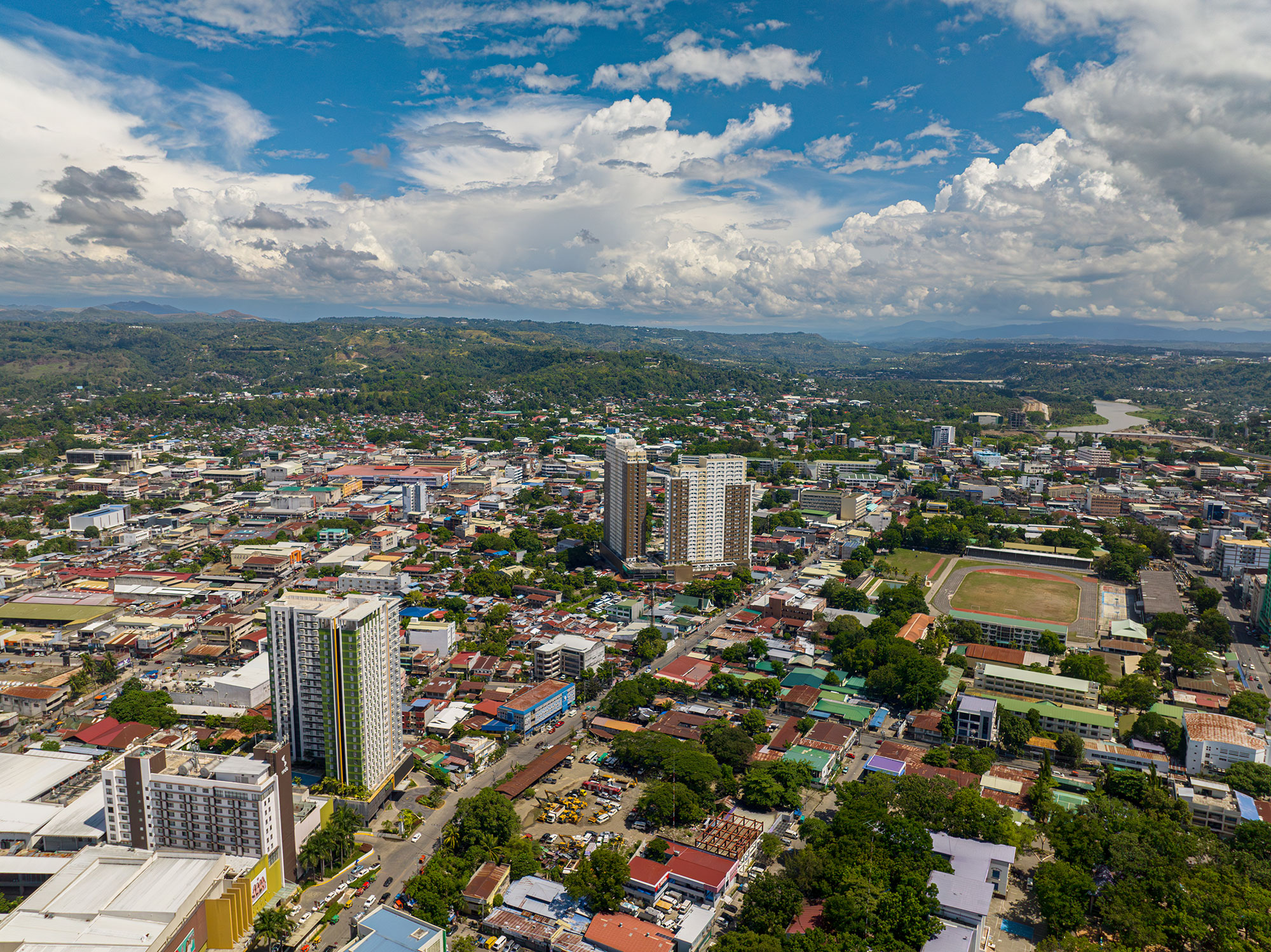 a city with many buildings and trees