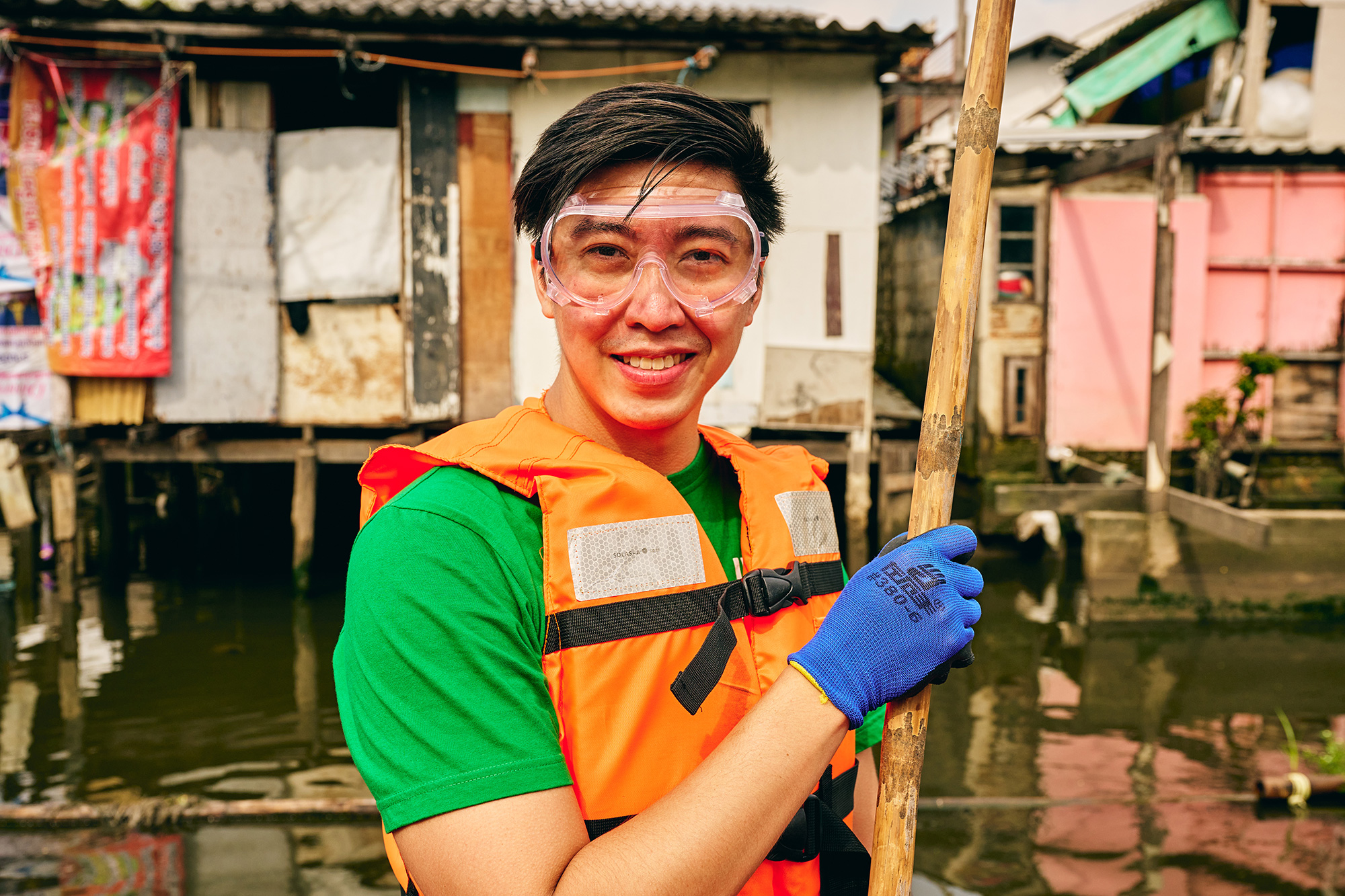 a man wearing safety goggles and a life jacket