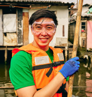 a man wearing safety goggles and a life jacket