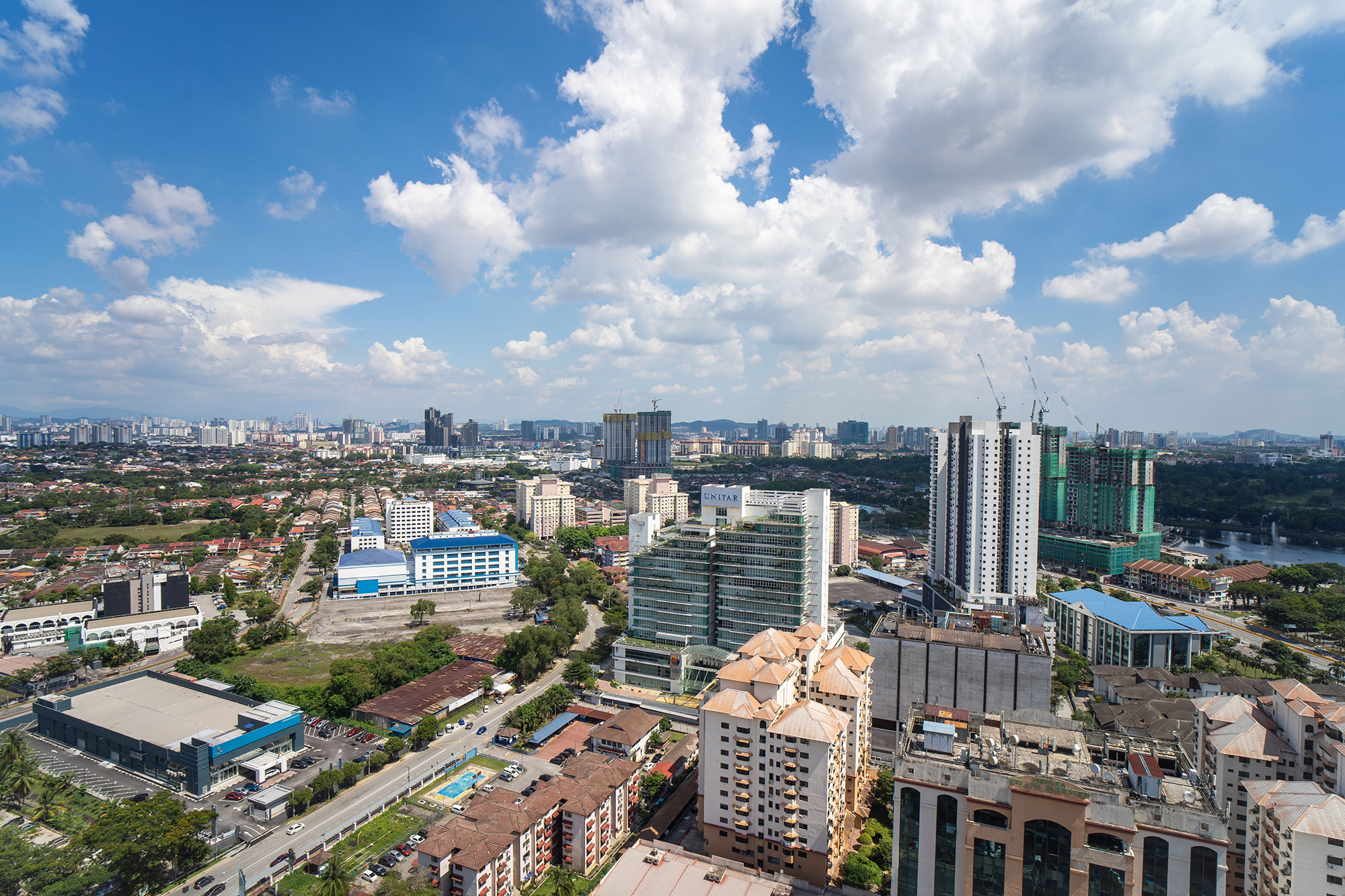a city with many buildings and a road