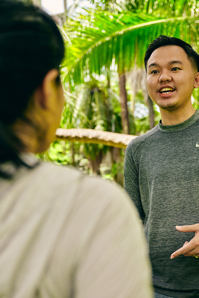 a man talking to a woman