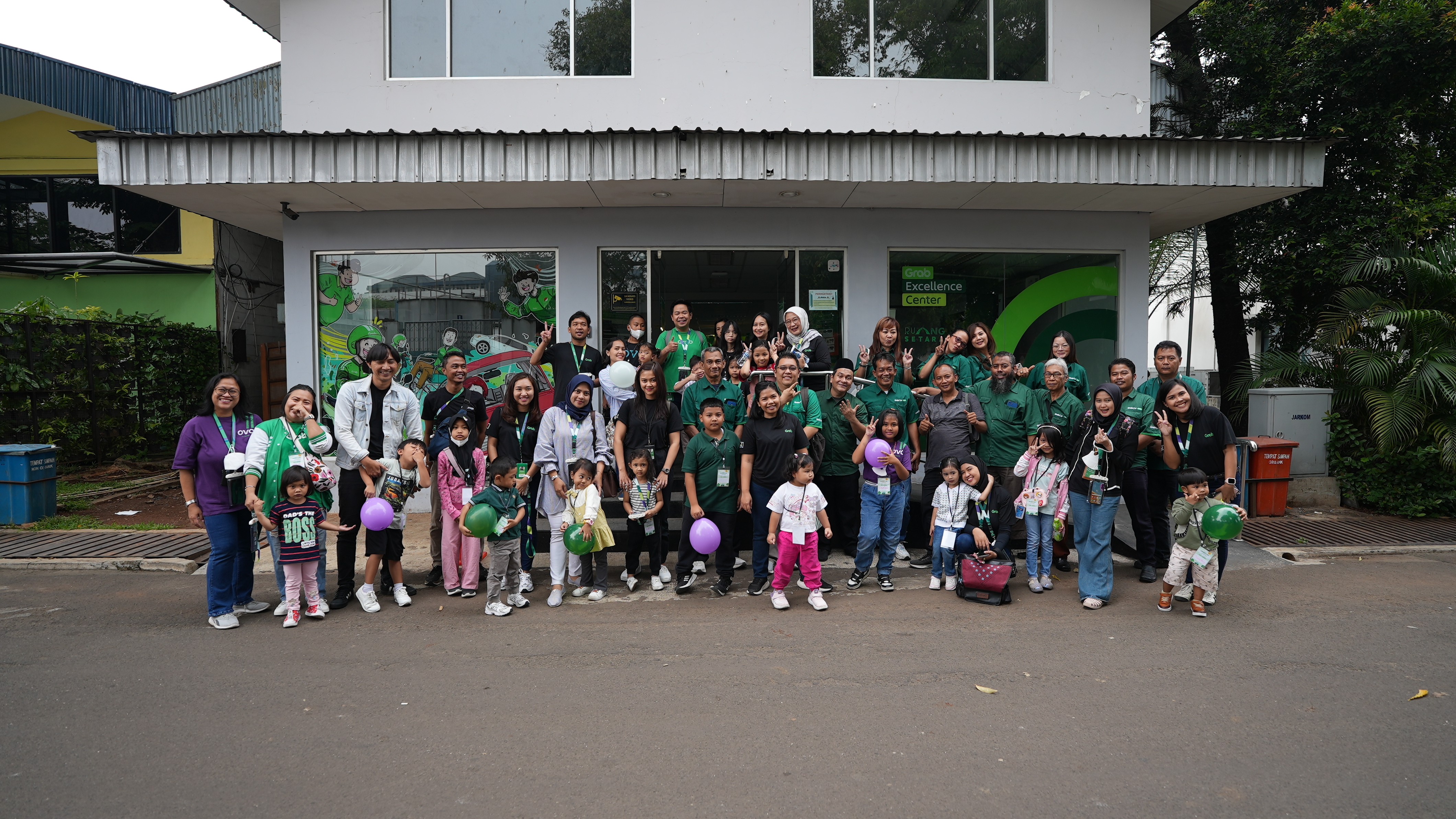 a group of people posing for a photo