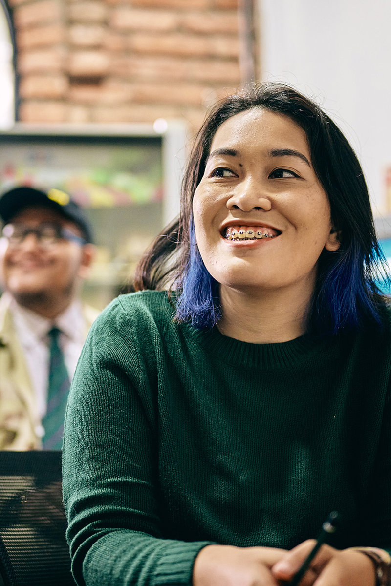 a woman smiling at camera