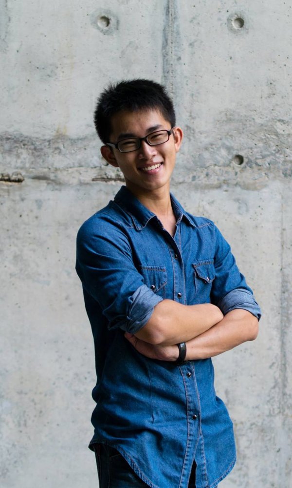 a man standing with his arms crossed