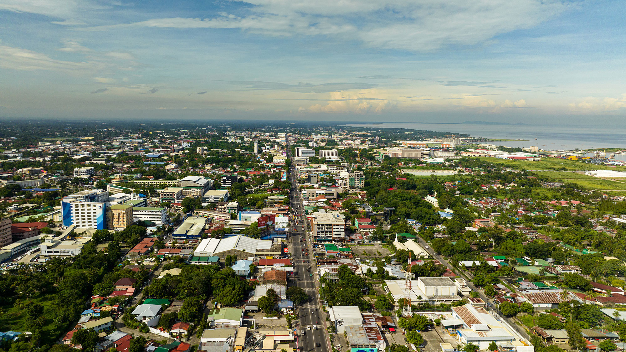 a city with many buildings and trees