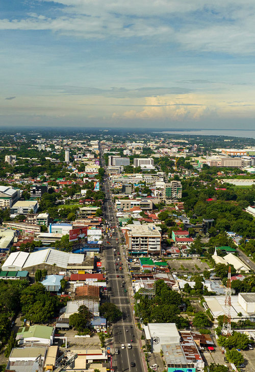 a city with many buildings and trees