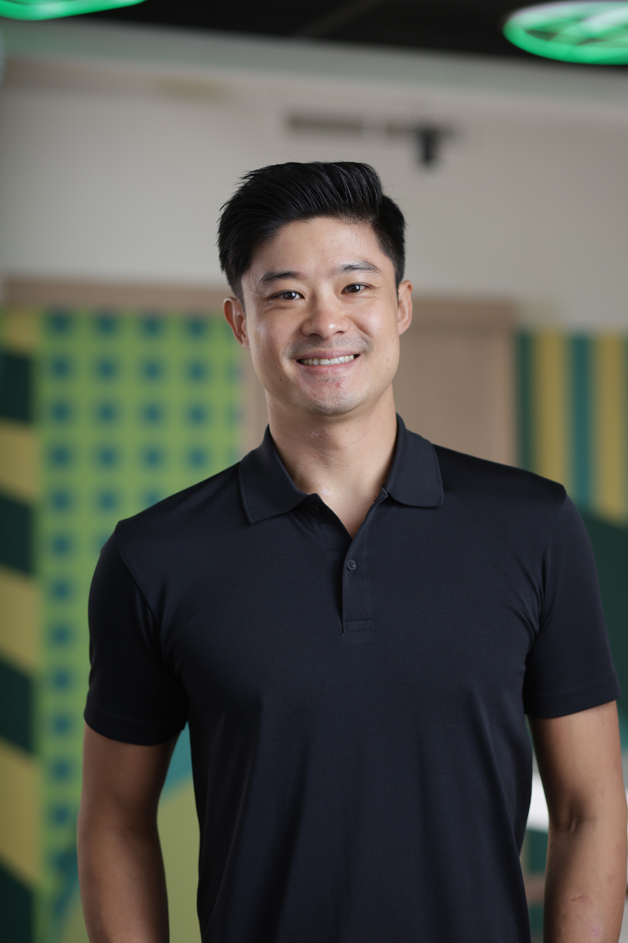 a man smiling at camera