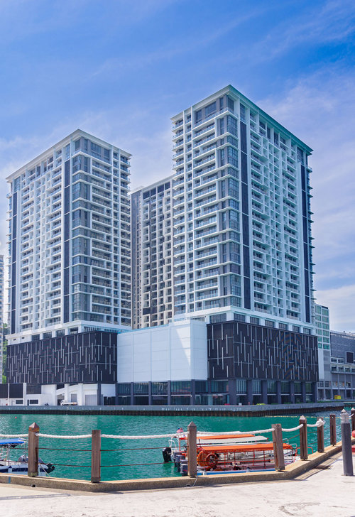 a water next to a building