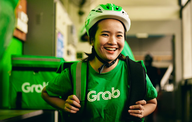 a person wearing a helmet and backpack