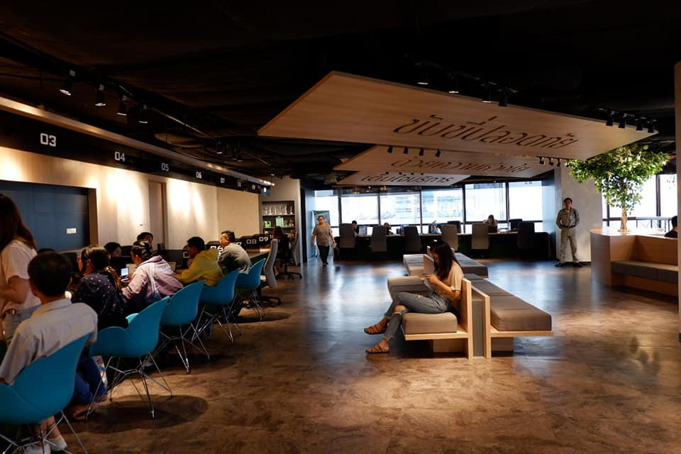 people sitting in a room with people