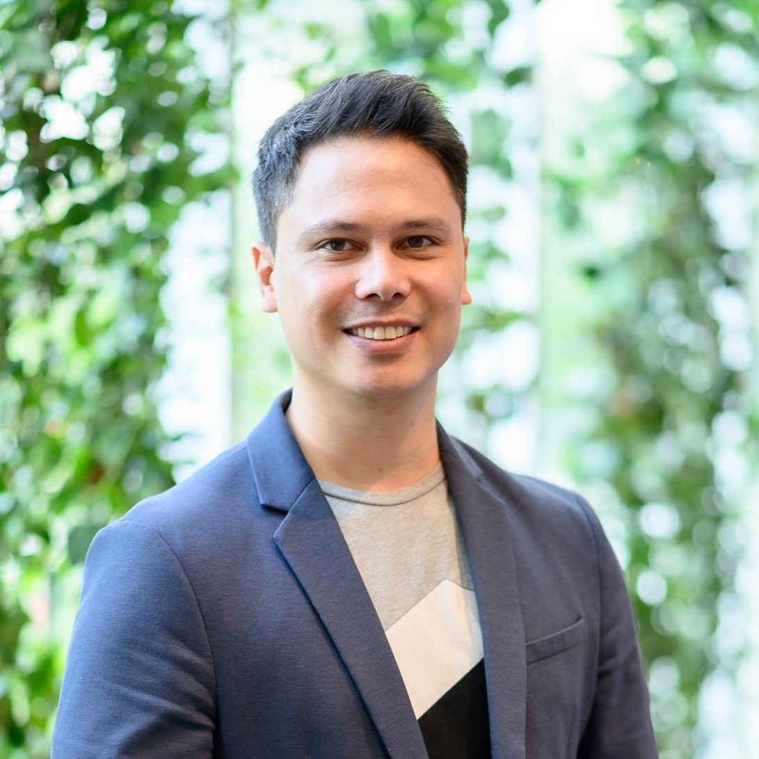 a man smiling at camera