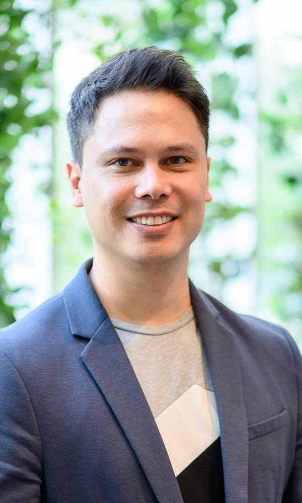 a man smiling at camera