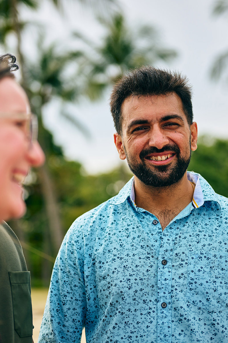 a man and woman smiling