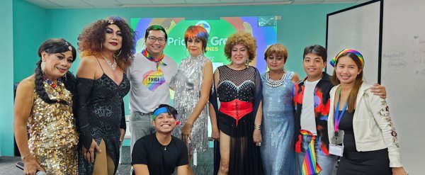 a group of people posing for a photo