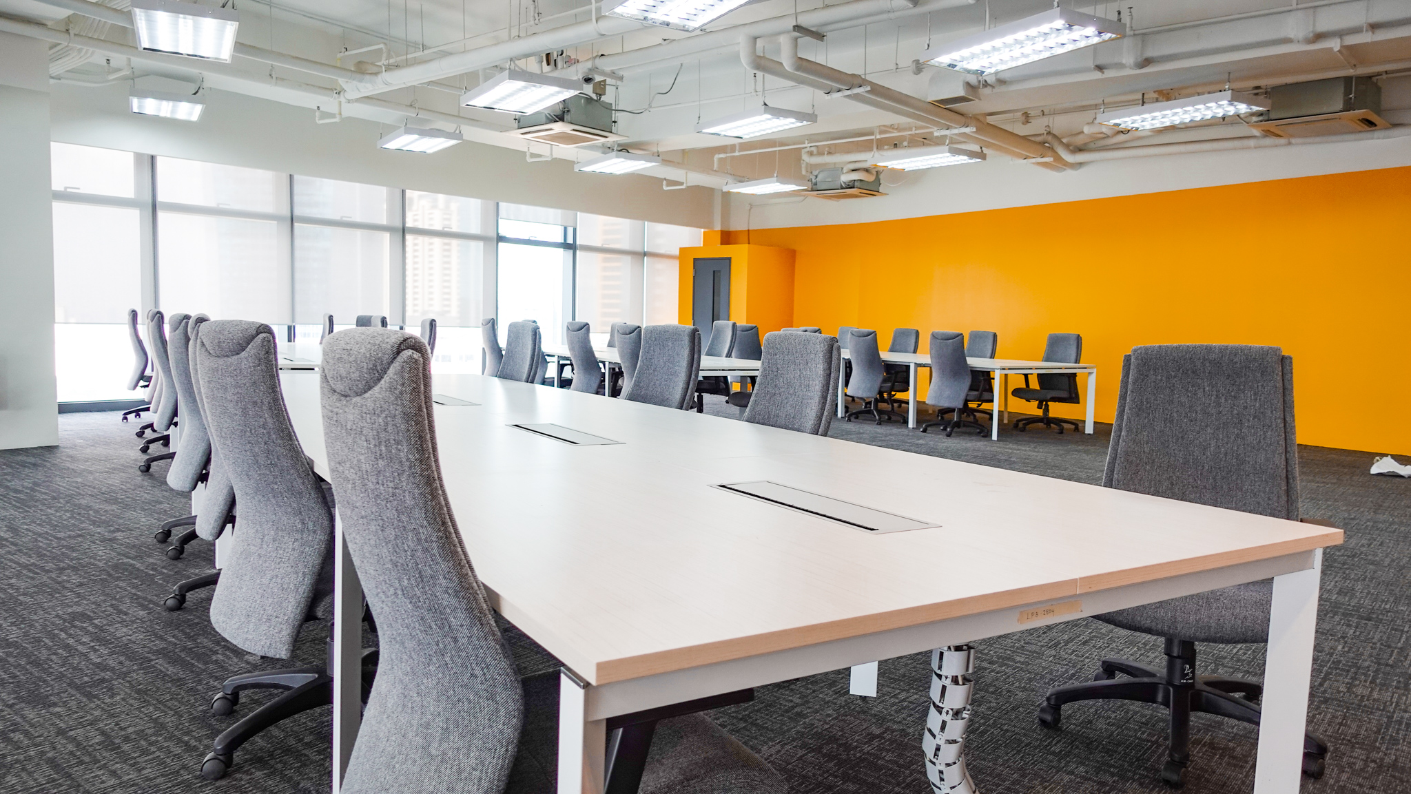 a conference room with chairs and tables