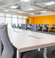 a conference room with chairs and tables