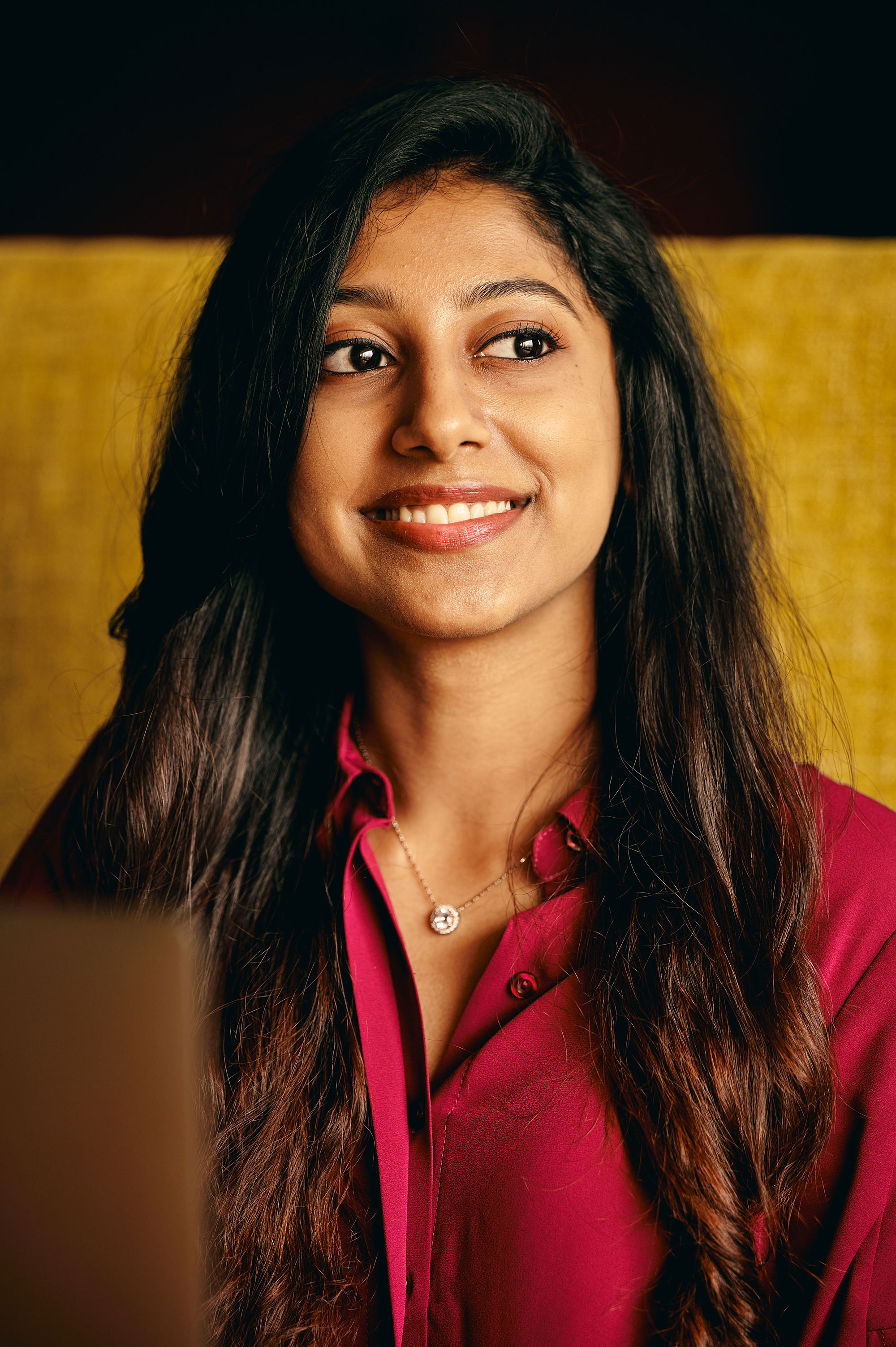 a woman smiling at the camera