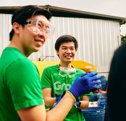 a group of men wearing safety goggles and gloves