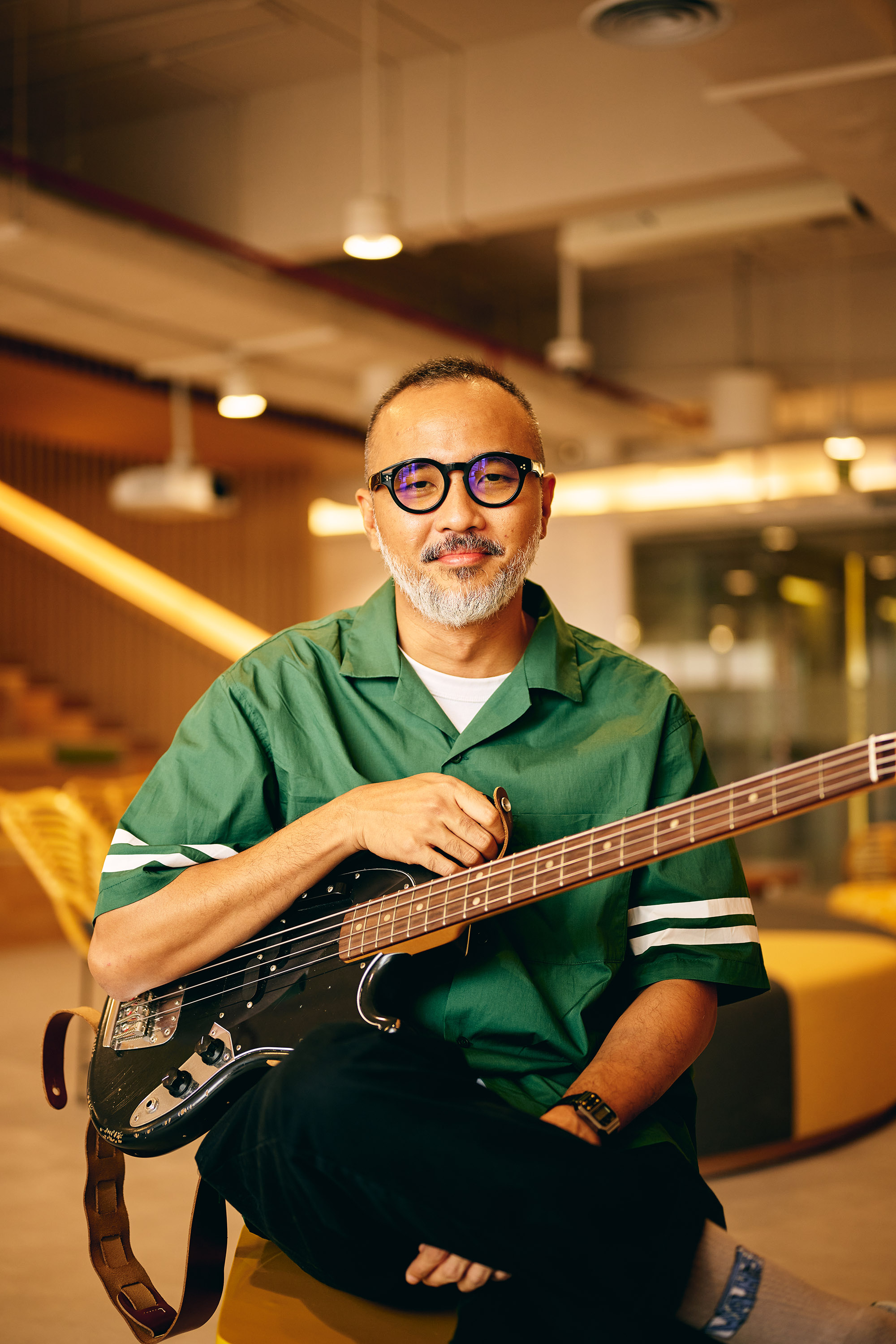 a man holding a guitar